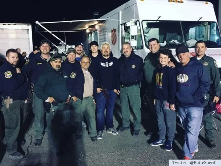 Guy Fieri cooks for firefighters. 