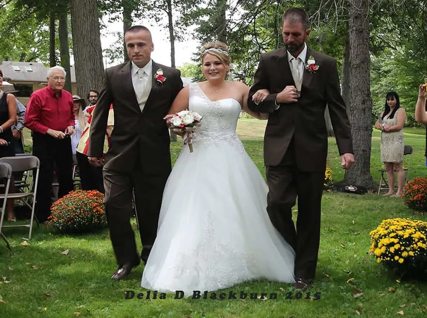 Bride's dad stops wedding so stepdad can walk down the aisle too