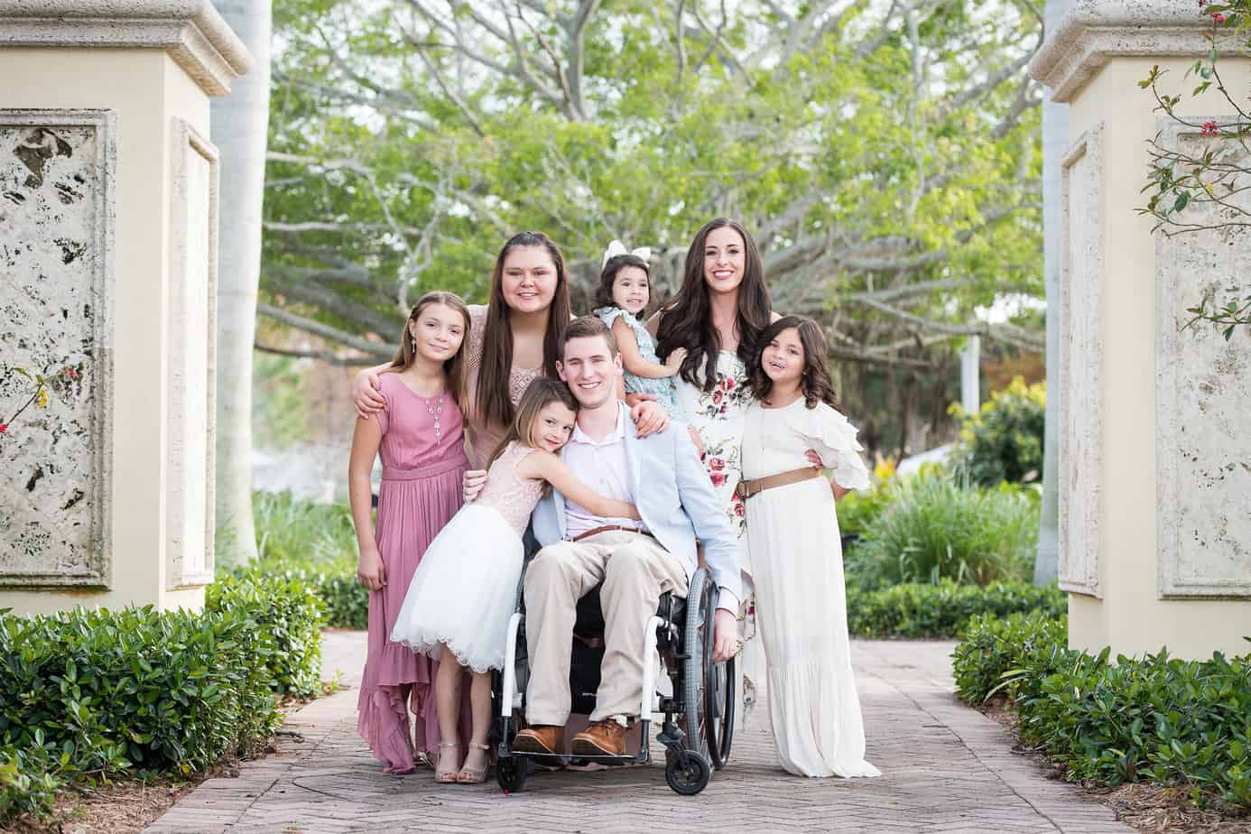 Paralyzed dad and his family. 