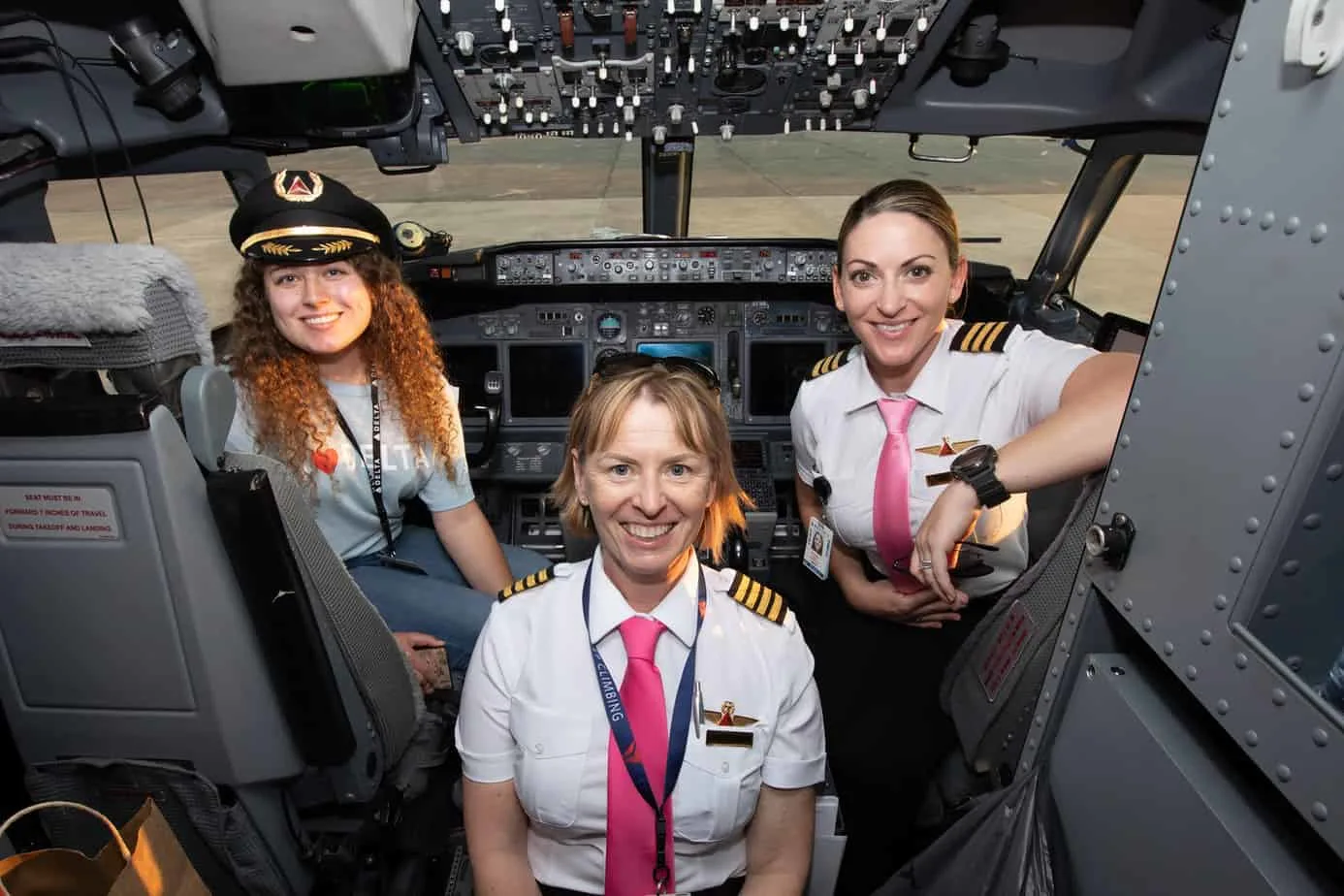 All-women airline crew flies 120 girls to NASA headquarters to inspire ...