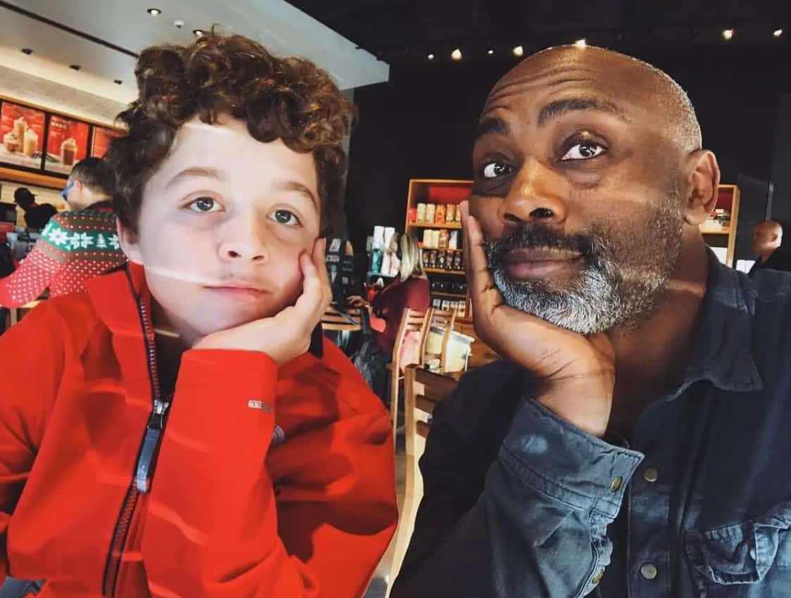 A new family that came about through adoption -- father and son.