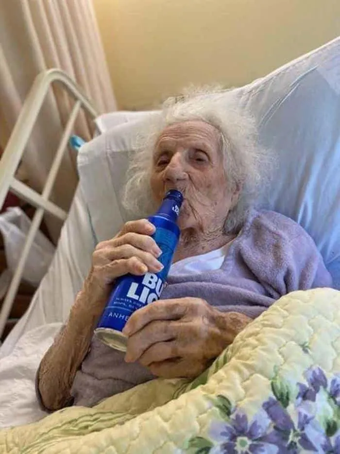 Nursing home staff help grandma celebrate recovery.