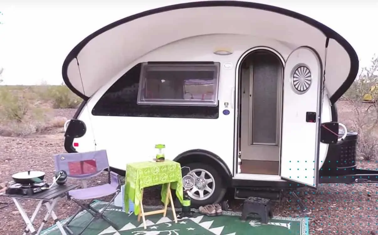 A photo of her tiny teardrop trailer home.