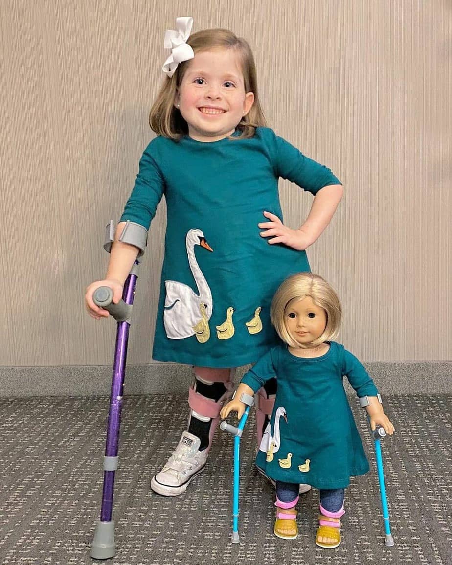 Eliza with her mini me doll