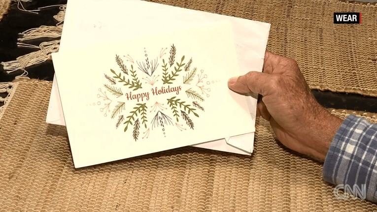 Holiday card that was sent to families whose bills Michael Esmond paid last year in Gulf Breeze, Florida