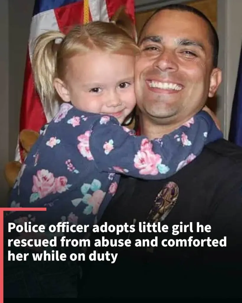 Police officer adopts little girl he rescued from abuse and comforted