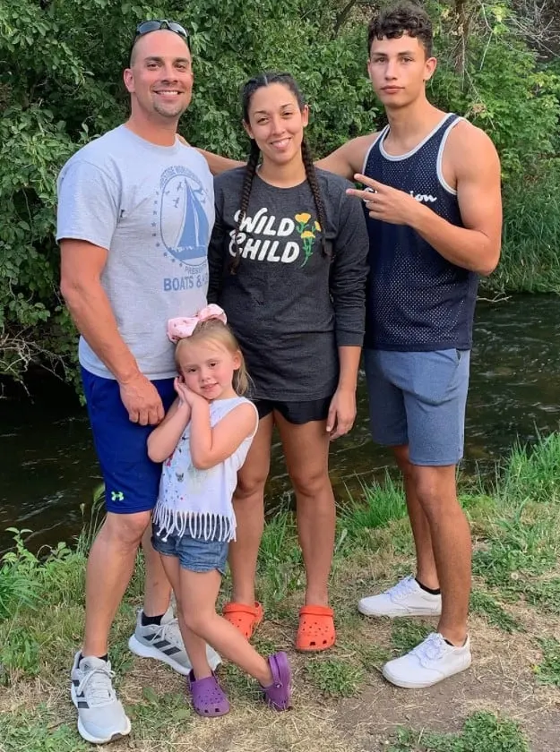 A photo of the Zach family while on a hike.