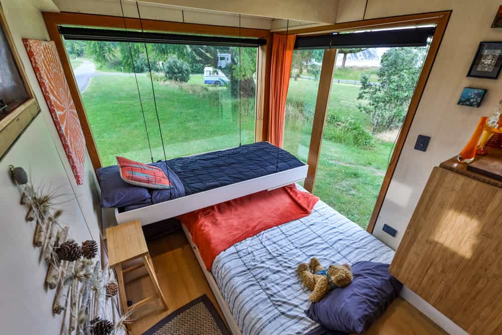 Two beds in a tiny house truck
