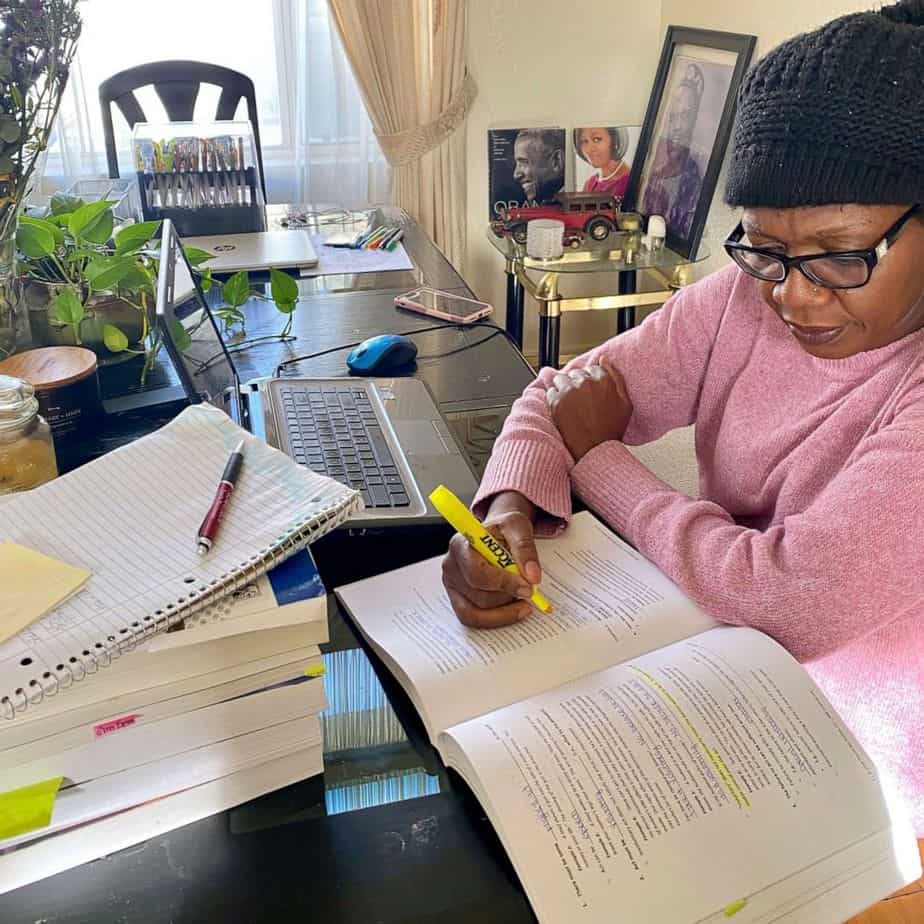 Working mother Evelyn Uba studying for the bar exam
