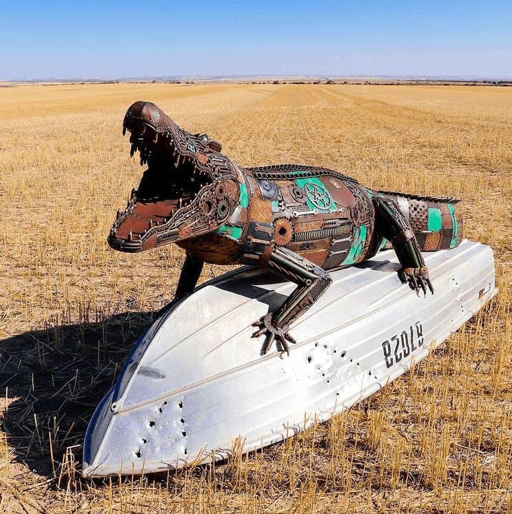 A terrifying sculpture of a crocodile, created by the talented metal artist Jordan Sprigg