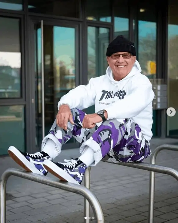Gramps, smiling gleefully on his comfy streetwear fashion