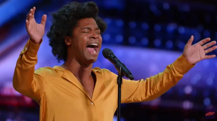 Jimmie Herrod singing on the America's Got Talent stage
