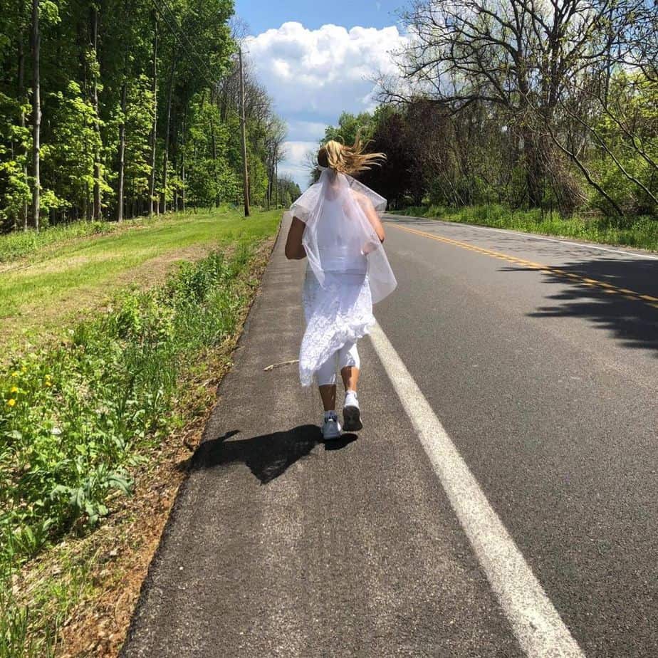 Vanessa Reiser running in her modified wedding dress 