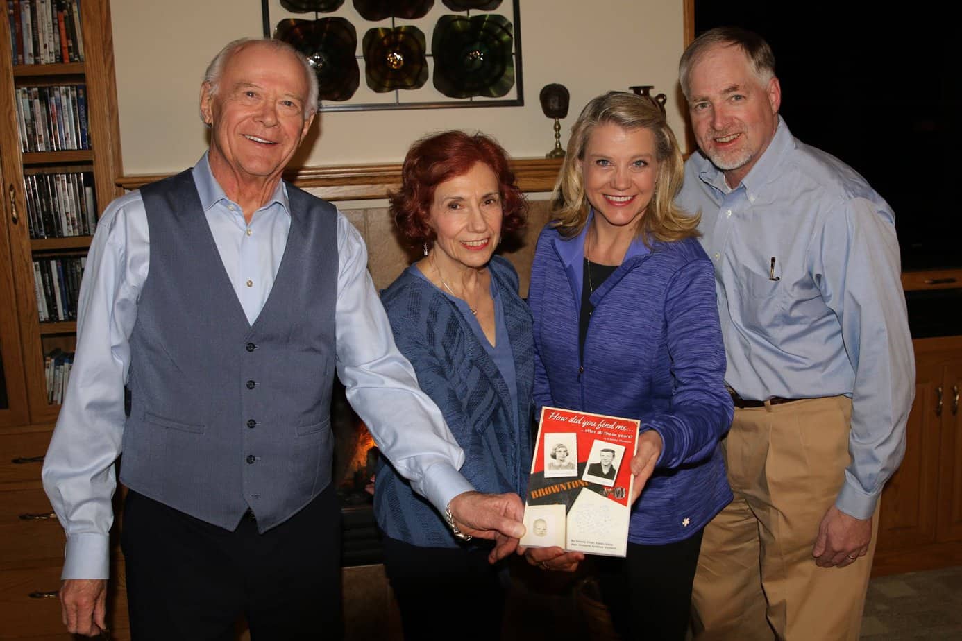 Dennis Vinar, Karen Lehmann, Jean Voxland, and Andrew Voxland holding the "How Did You Find Me?" book