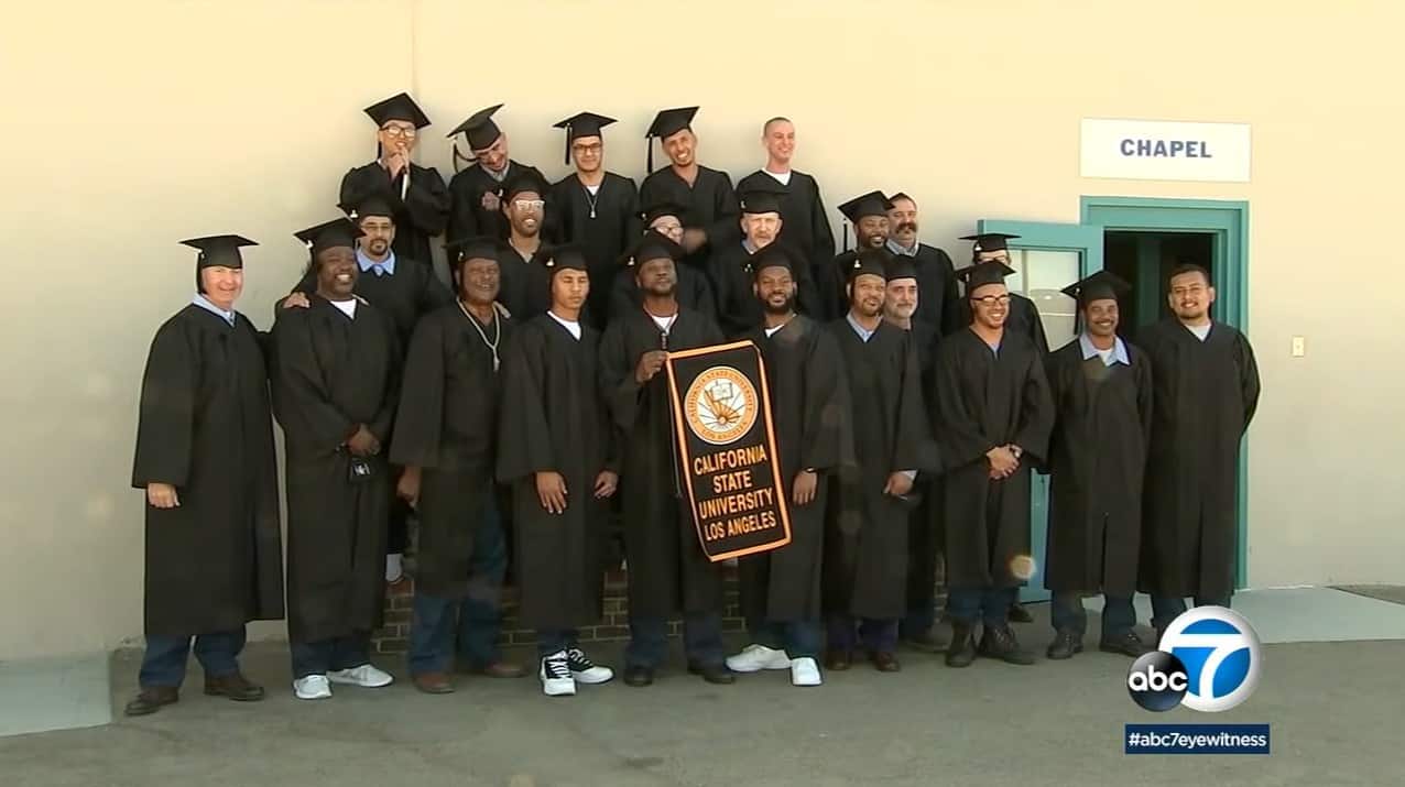 Inmates sporting their cap and gown during their graduation ceremony