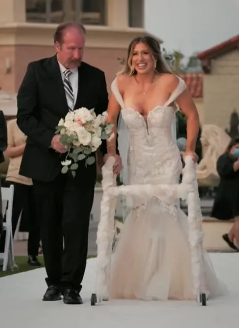 Chelsie Hill walking down the aisle with her father