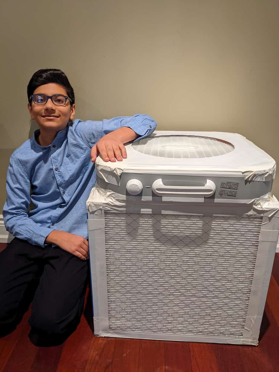 Shiven Taneja with one of the air purification boxes he built