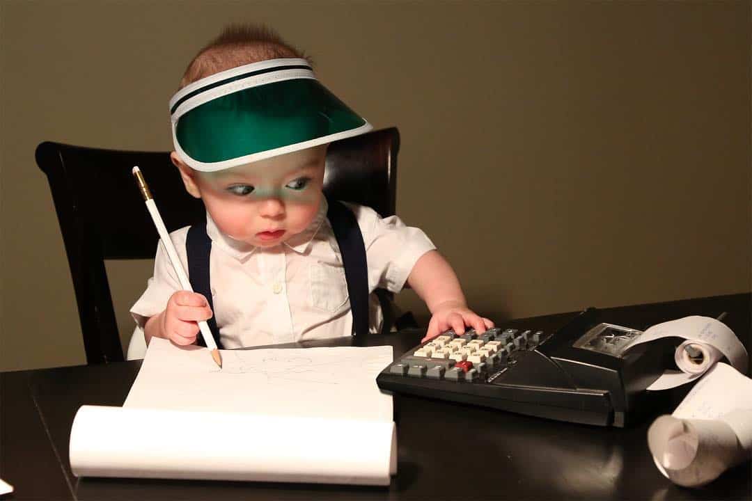 A Photoshopped picture of baby Ryan doing his taxes