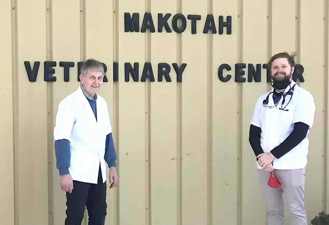 Dr. Robert Bogan and Dr. Zach Adams standing in front of Makotah Veterinary Center
