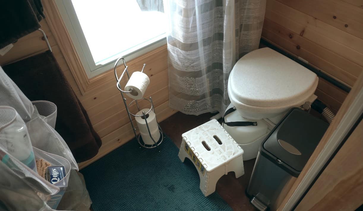 The bathroom inside a tiny trailer home