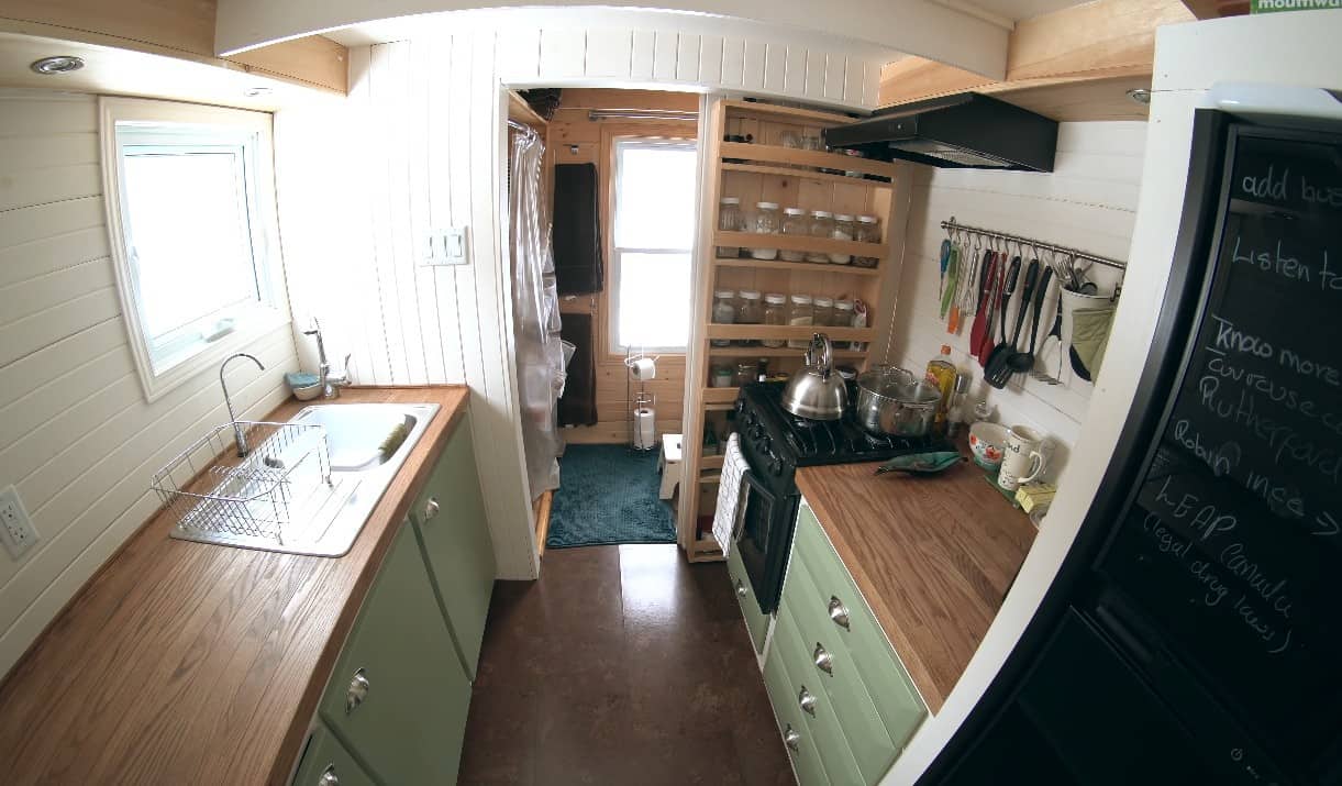 The kitchen inside a tiny trailer home