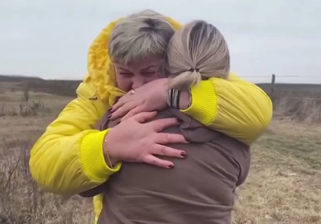 Nataliya Ableyeva and Anna Semyuk hugging