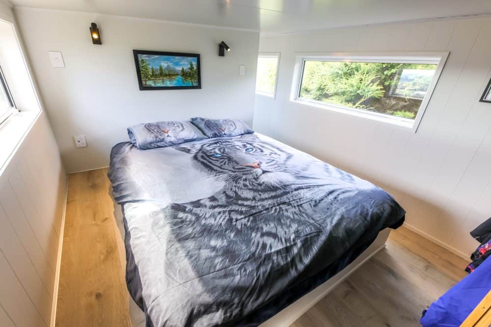 The bedroom of a tiny house in Auckland, New Zealand