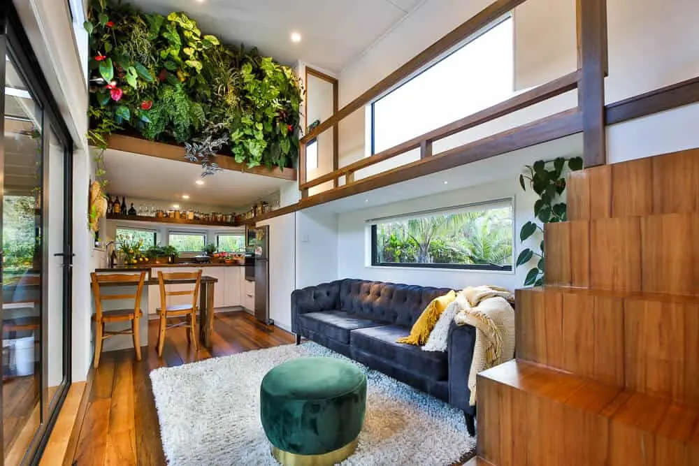 The lounge area inside a tiny house with a rooftop garden