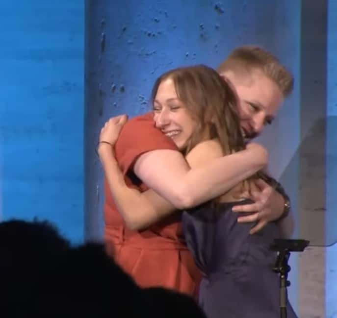 Gwen Cinquemani and Haven Davis hugging onstage during a Be The Match gala in New York