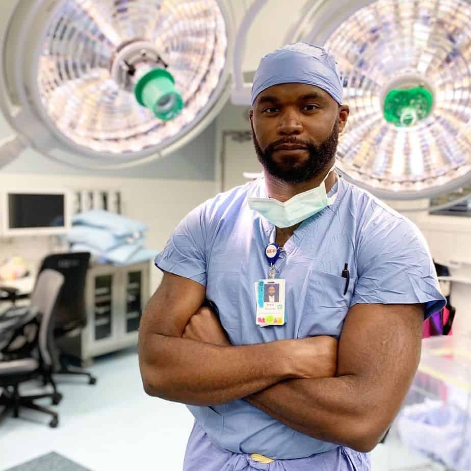 Myron Rolle wearing scrub suits inside an operating room - Philosophy of Success