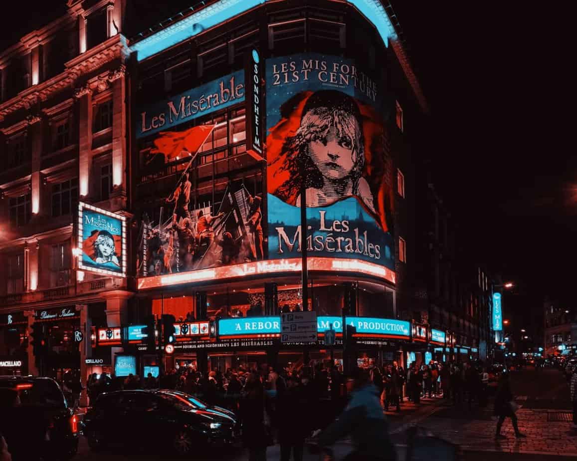 A poster of Les Miserables in Queen's Theater in London