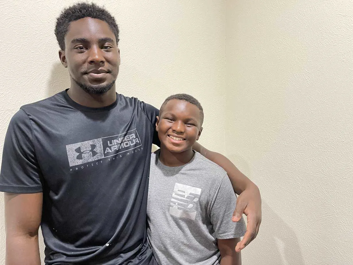 Brothers who lost both parents and nearly their home when a contractor(02)