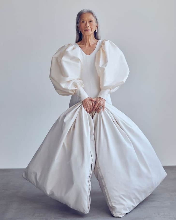 Rosa Saito in a white dress