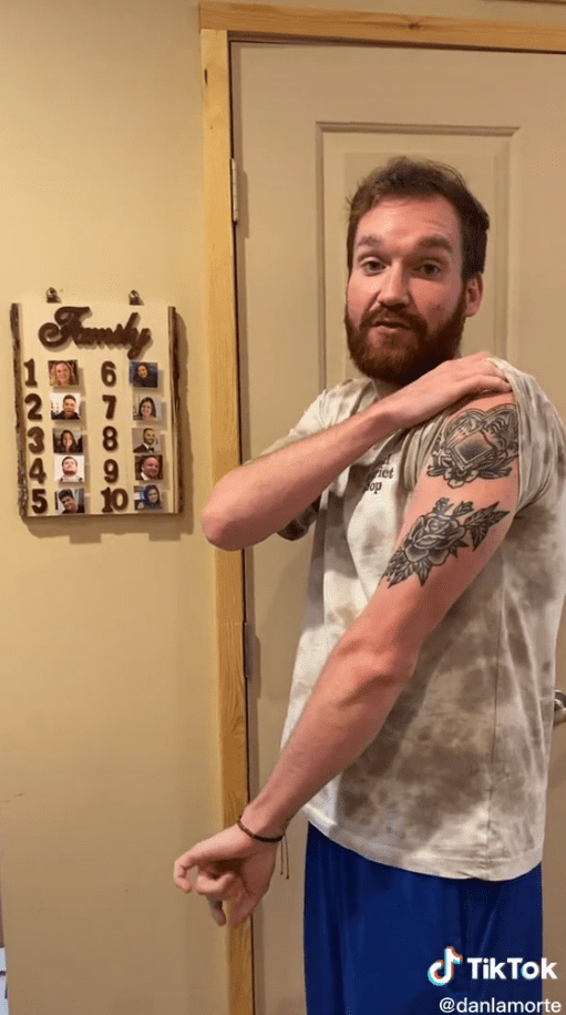 Dan shows off the tattoos that might affect his ranking on the leaderboard.