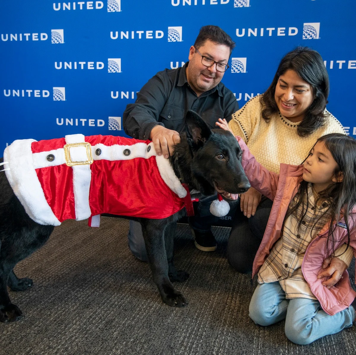 Polaris at his adoption party last December 15, 2022, with his new family 