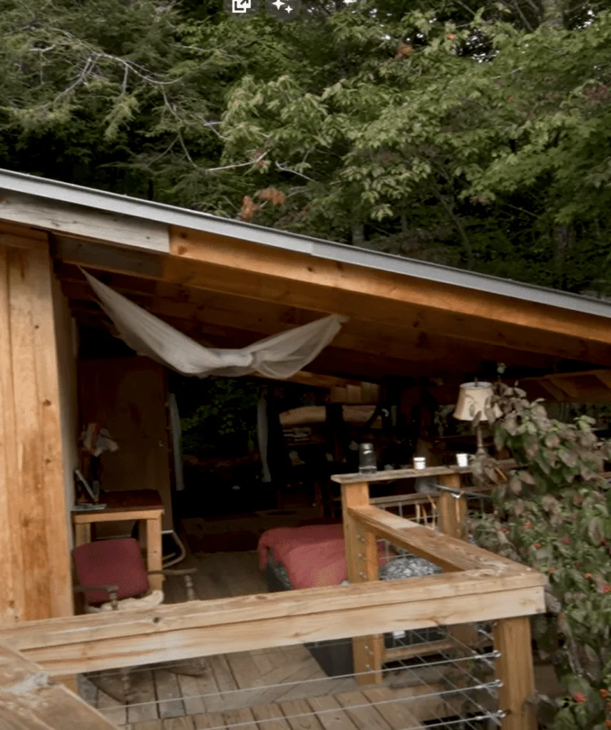Log cabin's outdoor bedroom.