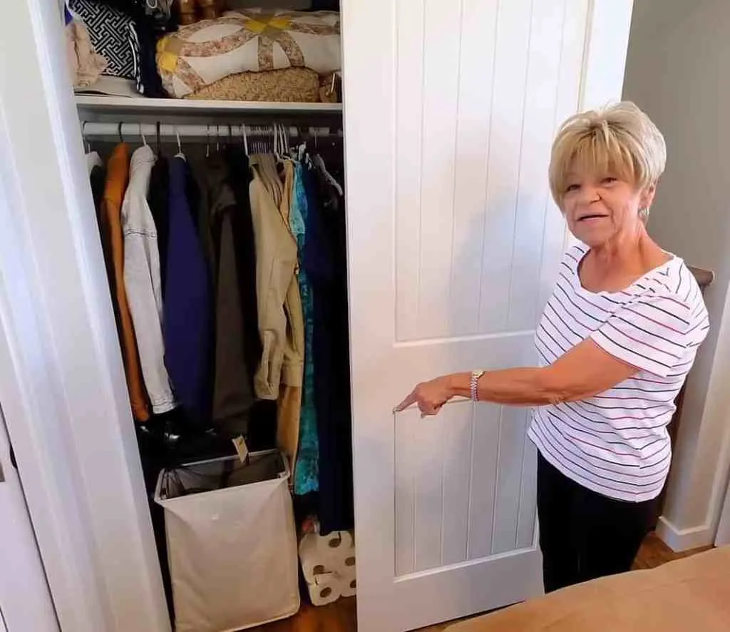 Charlene shows the one of the two sliding doors in her bedrom