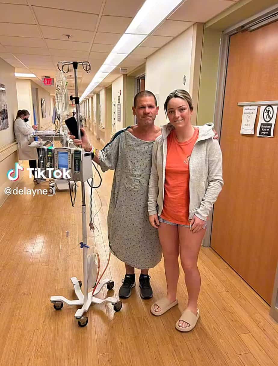 Delayne and John posing for a photo before their surgery.