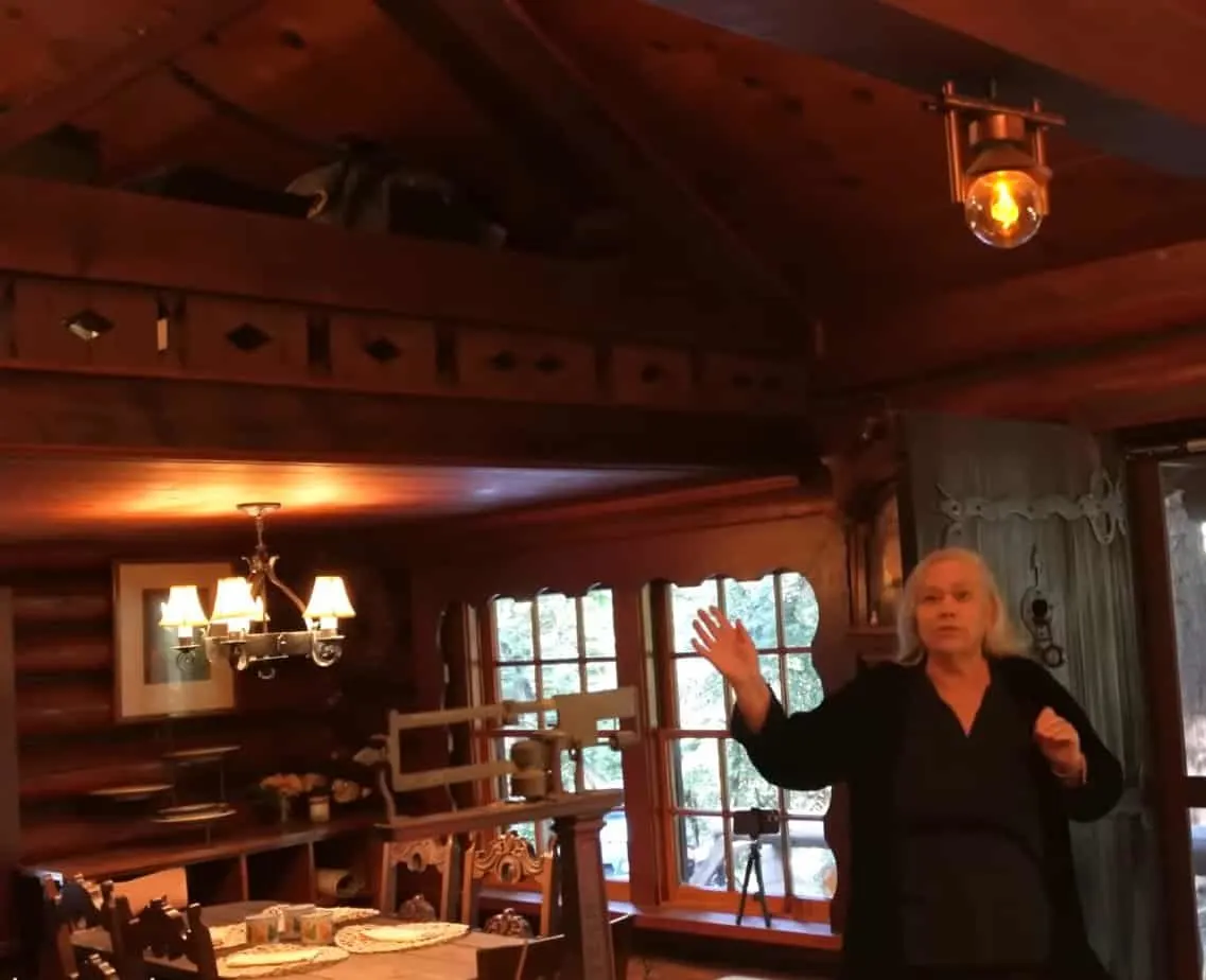 Marianne shows some more artistic designs inside the log cabin.