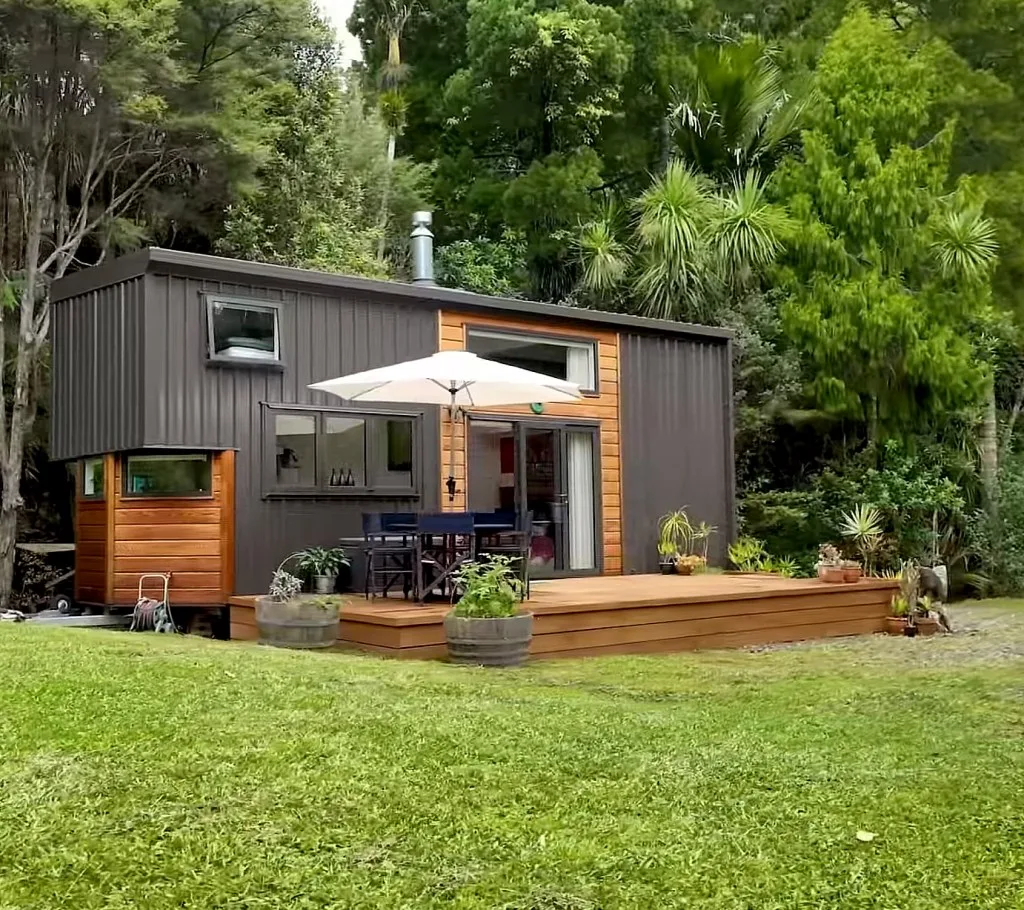 Front view of the off-grid living forest tiny house.