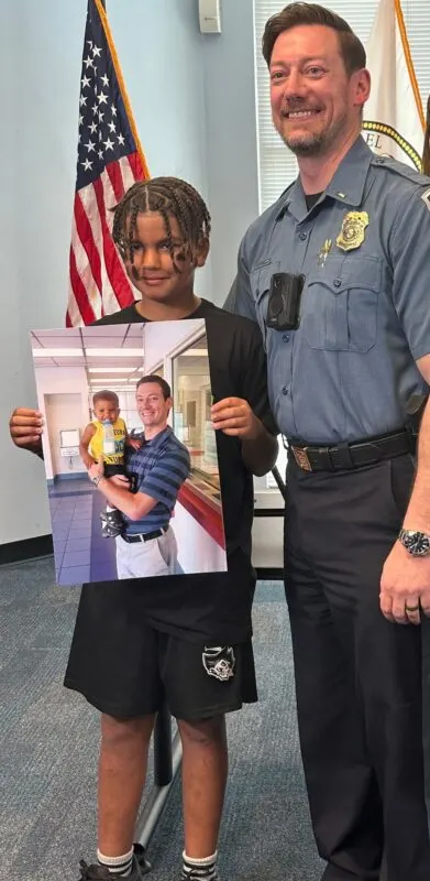 Anne Arundel County police officer with the boy he saved a decade ago