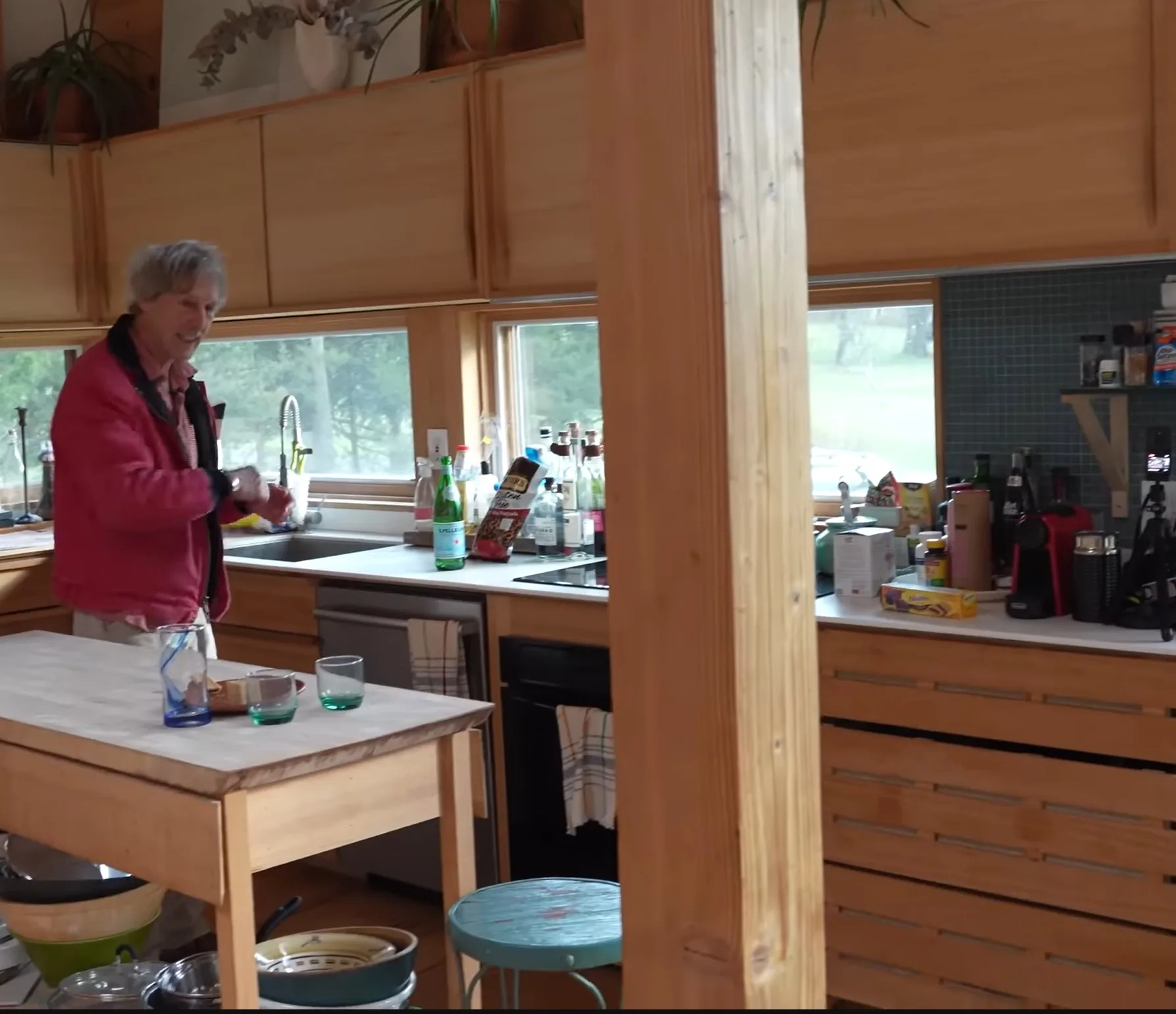 Cabin's kitchen with built-in cabinetries made of cypress and bamboo.