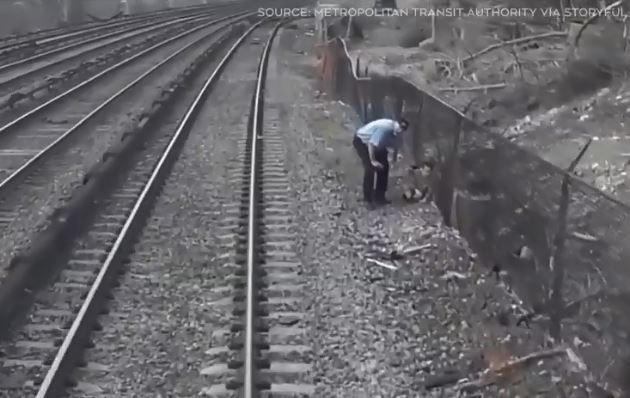 One of the rail workers save a boy from train tracks
