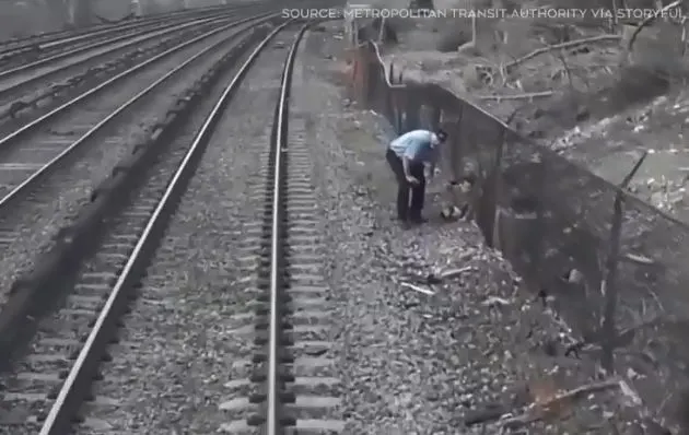 One of the rail workers save a boy from train tracks
