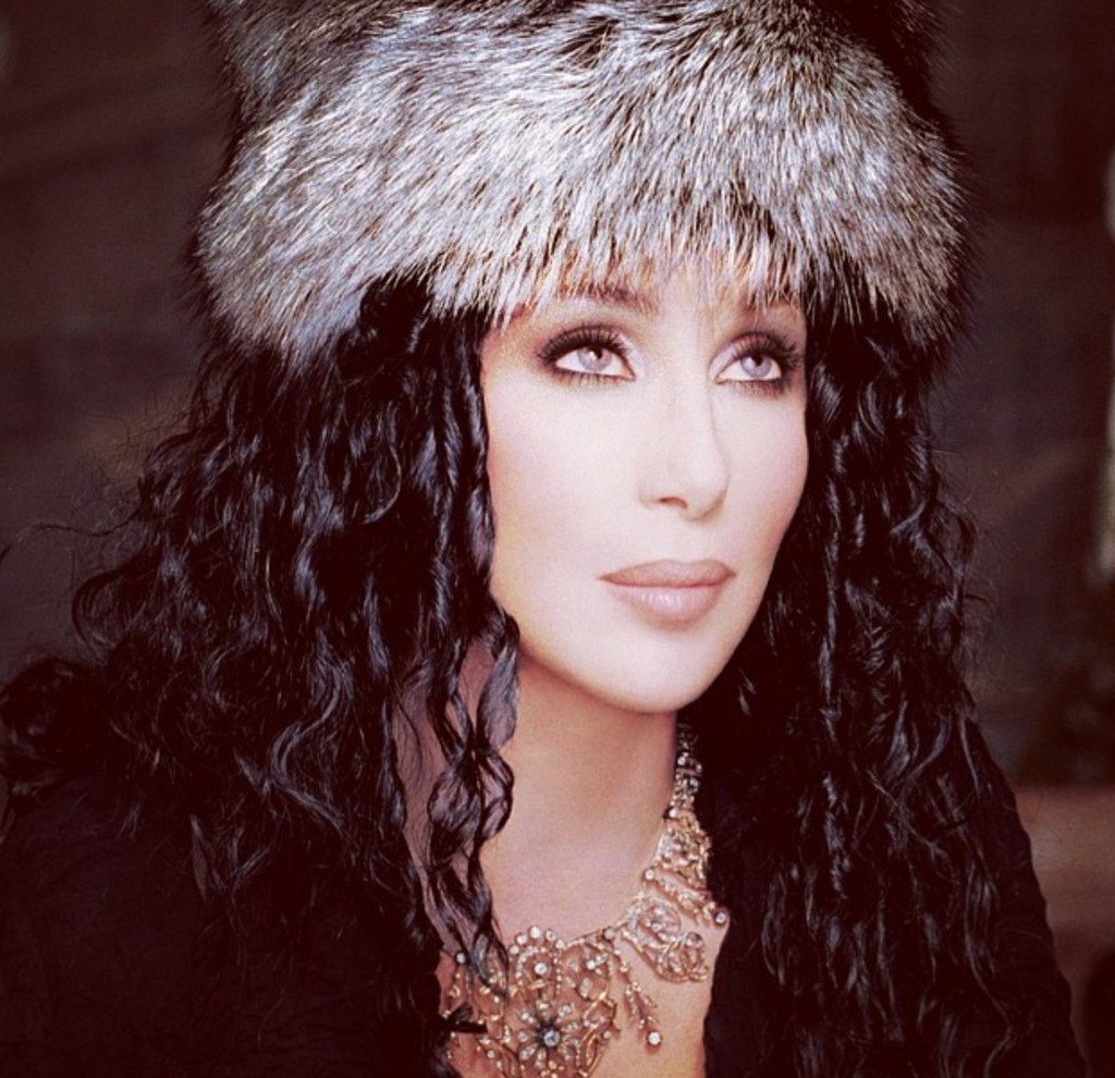 Cher, posing for a photo.