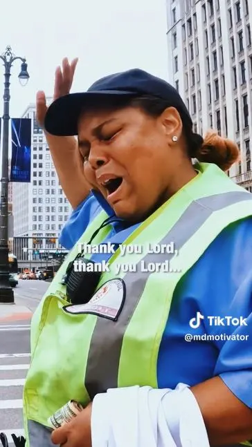 Detroit traffic cop praises God for the blessing she received.