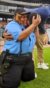 Detroit traffic cop is tearful as she heard how much her fundraiser earned.