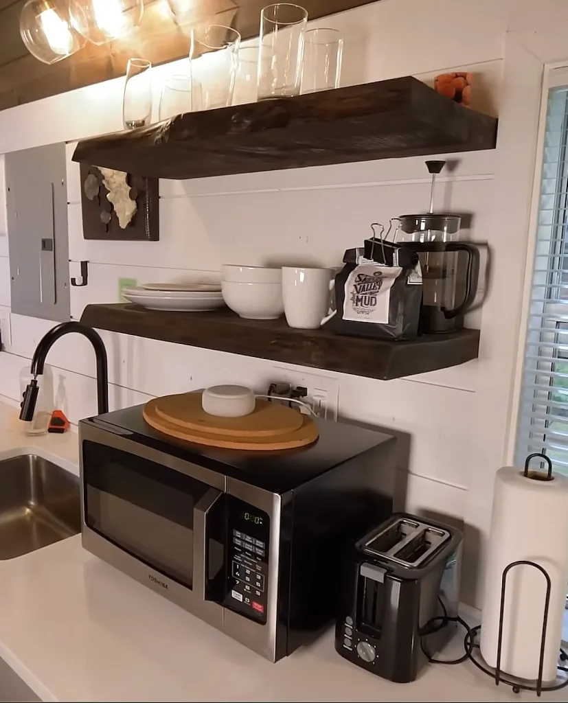 Small appliances and the hanging shelves in Claybaby's kitchen.