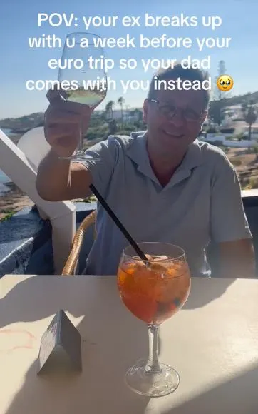 Dad enjoys cocktails during their European holiday