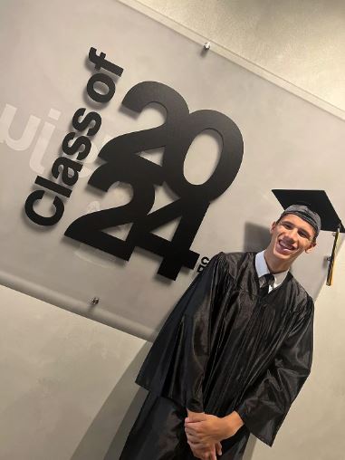 Gabriel is all smile on his graduation day.